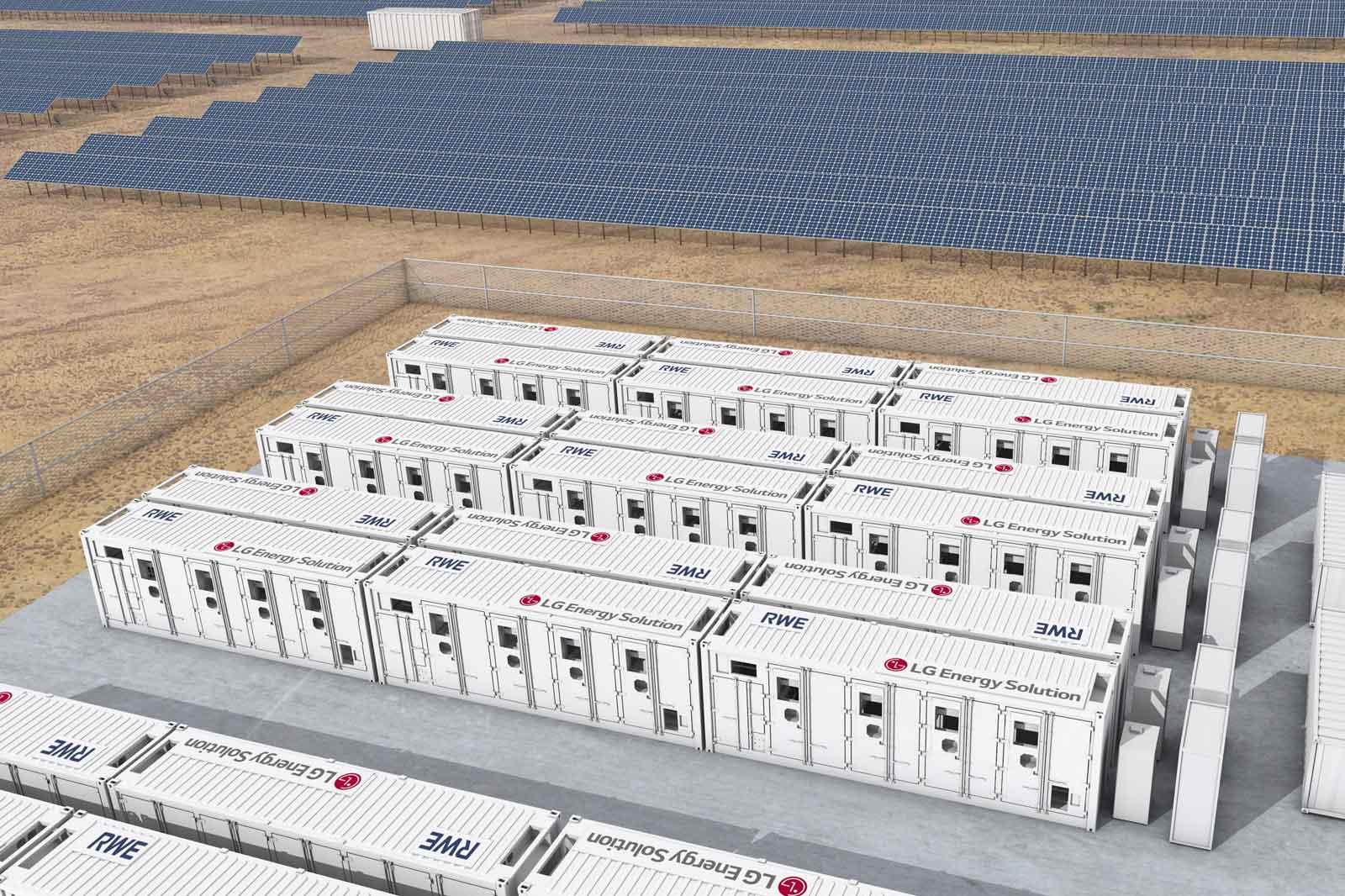 A solar energy facility featuring numerous containers labelled with LG Energy Solution and RWE among solar panels under a clear sky.